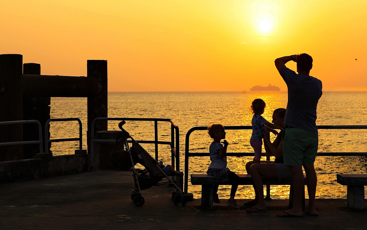 Mother holding child's hand